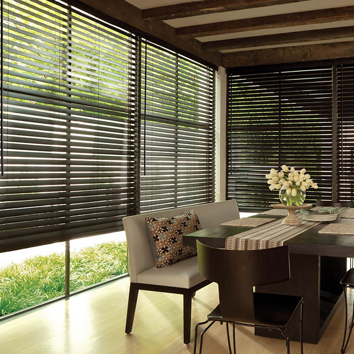 Dark wood blinds in a kitchen.