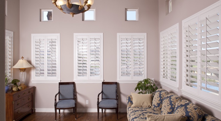 Modern sunroom with plantation shutters