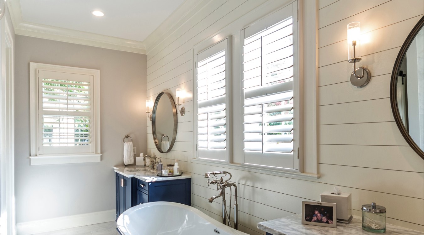 Dallas bathroom with white plantation shutters.