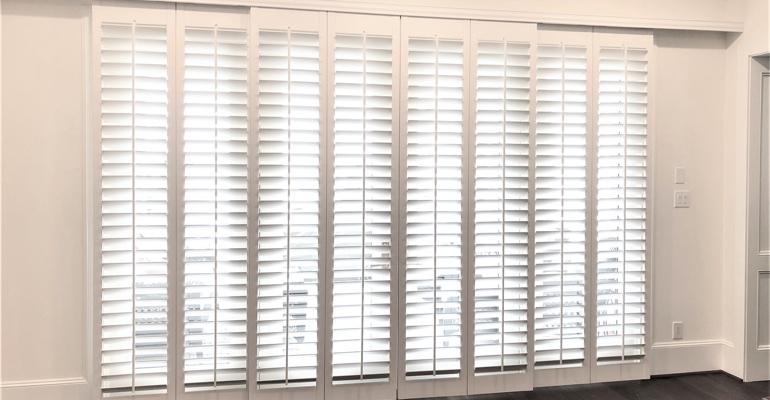 Interior sliding door shutters can transform your sliding glass doors into the focal point of any dark room. Plantation shutters on sliding doors