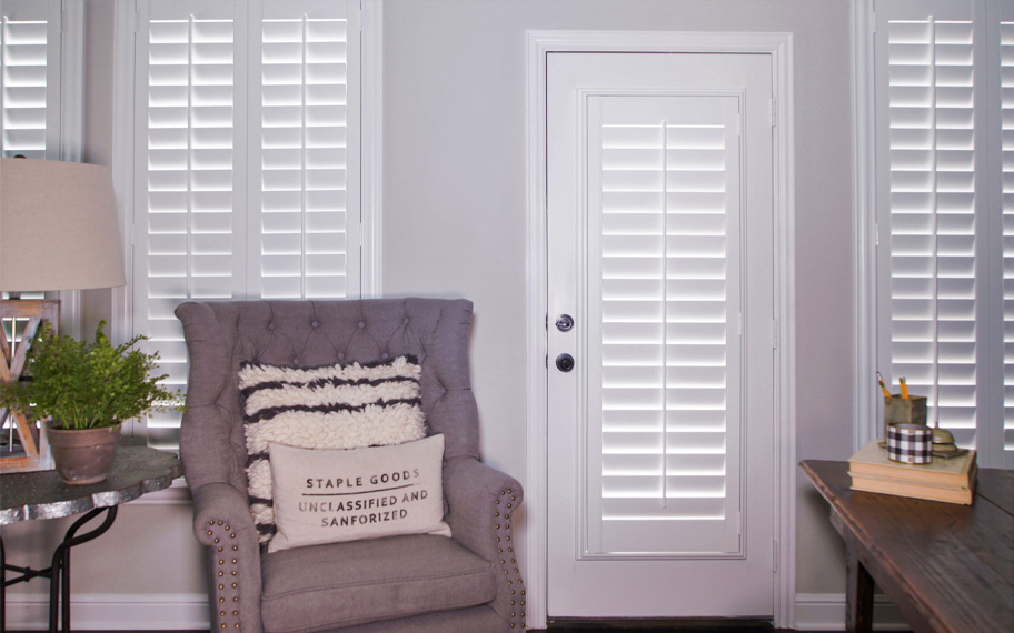 Interior shutters are beautiful and durable window treatments for glass doors in Dallas. Polywood shutters on a door