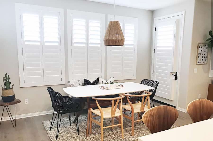 Use Polywood shutters to control natural light levels in your Dallas dining room. Polywood shutters with top louvers tilted open in a dining room