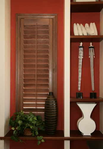 You can even coordinate your wood shutters with shelving. Dallas wood shutter shelving